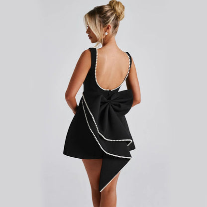 Elodie™ – Mouwloze jurk met strik