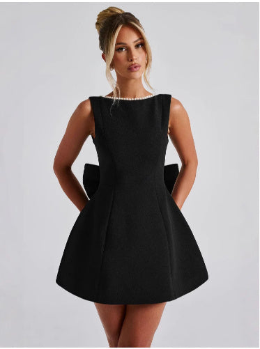 Elodie™ – Mouwloze jurk met strik